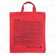 Taška s potiskem - notová osnova a podpisem Mozart v červené barvě