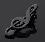 Černá spona na kravatu ve tvaru houslový klíč