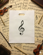 Igelitová taška s potiskem houslový klíč