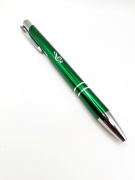 Zelené kovové kuličkové pero houslový klíč