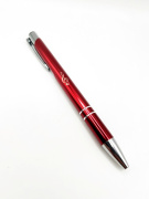 Červené kovové kuličkové pero houslový klíč